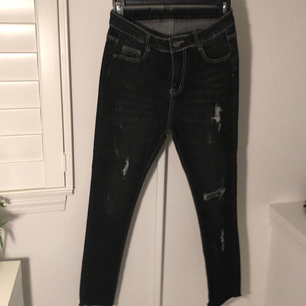 black ripped jeans